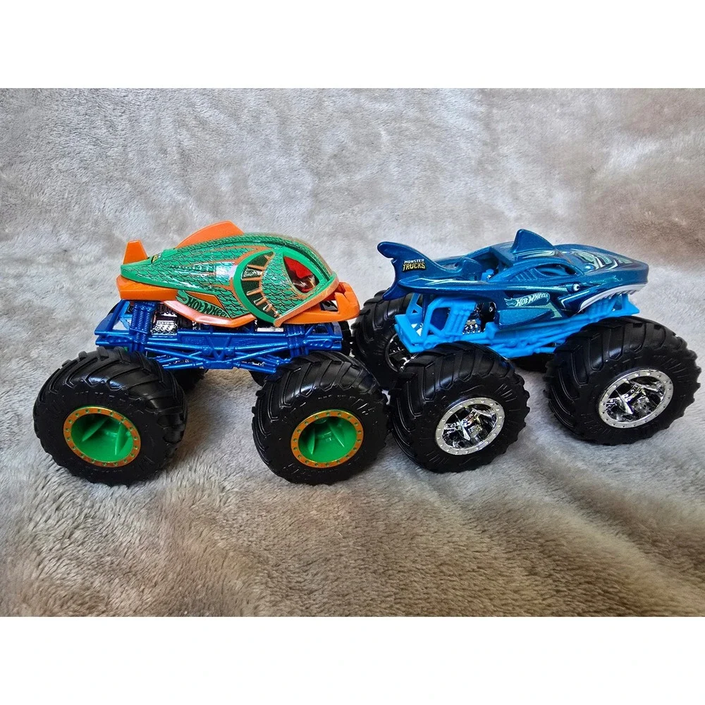 Hot Wheels Monster Trucks Shark Wreak and Piran-ahhh Blue Green Diecast Lot of 2